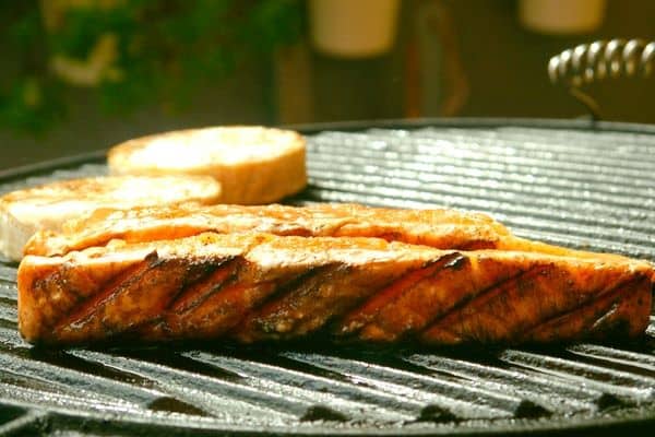 sliced fish on a griller