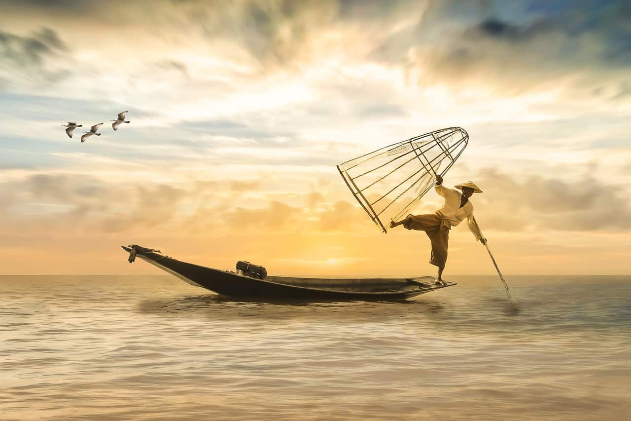 person doing traditional fishing