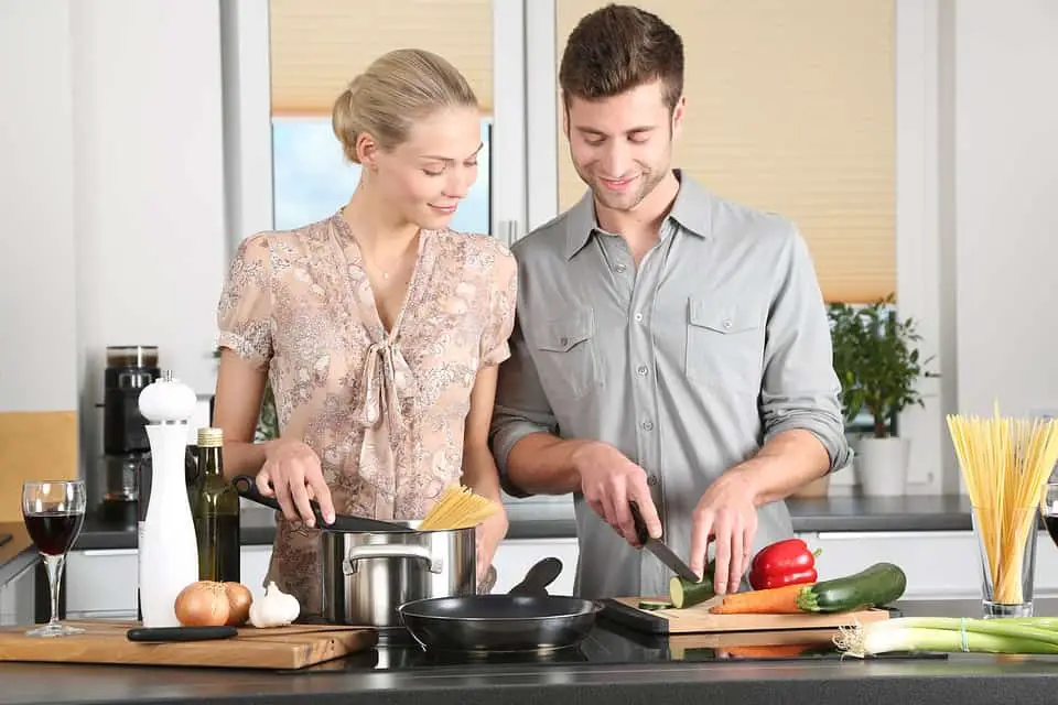 couple cooking their meal