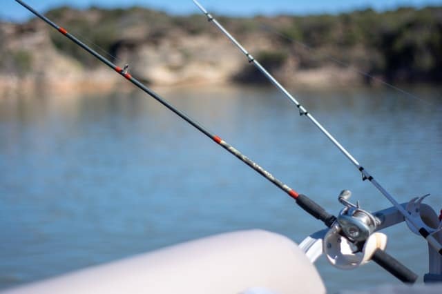 a fishing rod set up on a boat